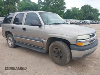 2003 Chevrolet Tahoe LS with VIN 1GNEC13V53R159937, listed as a IAAI auction lot 42138292 with 256,395 mi miles. Bid and sale history available at carsss.com. Image 1.