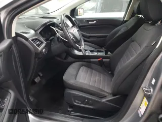 2020 Ford Edge SE z VIN 2FMPK4G9XLBA07766, wystawiony jako Copart lot #56852365 z przebiegiem 151 664 mil mil oraz Szkoda całkowita • Salvage title. Historia ofert i sprzedaży dostępna na DreamBid. Obrazek 7.