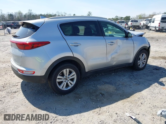 2018 Kia Sportage LX with VIN KNDPM3AC6J7422408, listed as a IAAI auction lot 41918342 with 104,385 mi miles and . Bid and sale history available at carsss.com. Image 4.