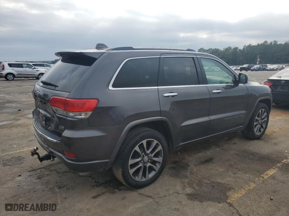 2017 Jeep Grand Cherokee Overland with VIN 1C4RJECG2HC903366, listed as a Copart auction lot 44140155 with 102,459 mi miles and Salvage Title. Bid and sale history available at carsss.com. Image 3.