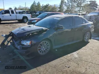 2010 Mitsubishi Lancer Evolution SE with VIN JA32W6FV8AU033981, listed as a Copart auction lot 87676155 with 150,901 mi miles and Salvage Title. Bid and sale history available at carsss.com. Image 1.