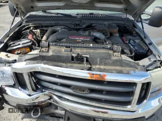 2004 Ford F-350 XL with VIN 1FTSW31P04EC44129, listed as a Copart auction lot 63519165 with 205,411 mi miles and Salvage title. Bid and sale history available at DreamBid. Image 11.