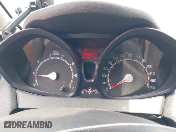 2013 Ford Fiesta S with VIN 3FADP4TJ4DM164594, listed as a IAAI auction lot 42154202 with 75,860 mi miles and . Bid and sale history available at DreamBid. Image 7.