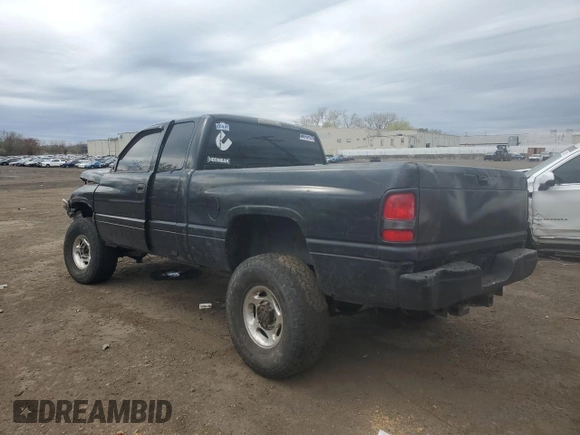 2001 Dodge Ram 2500 with VIN 3B7KF23671G169545, listed as a Copart auction lot 52175465 with 317,795 mi miles and Salvage Title. Bid and sale history available at carsss.com. Image 2.