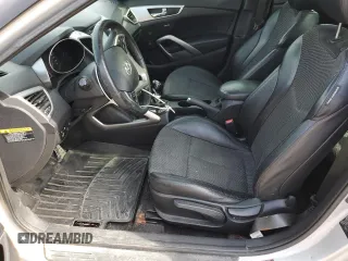 2013 Hyundai Veloster w/Black Int с VIN KMHTC6AD4DU139261, выставлен на аукционе Copart как лот 56175095 с пробегом 148 483 миль миль и Чистый • Clean title. История ставок и продаж доступна на DreamBid. Изображение 7.