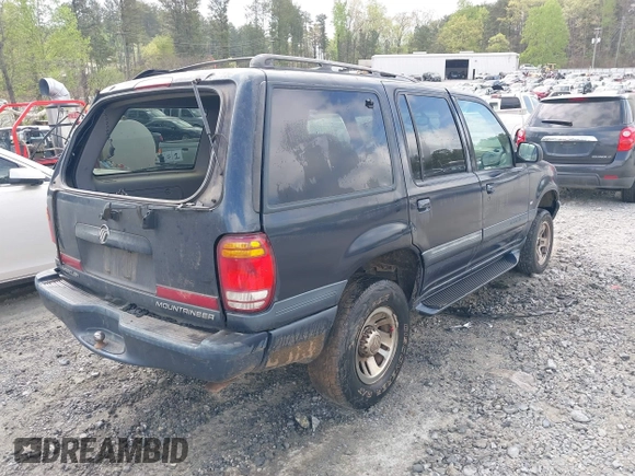1999 Mercury Mountaineer z VIN 4M2DU52P3XUJ37055, wystawiony jako IAAI lot #41940577 z przebiegiem 218 702 mil mil oraz . Historia ofert i sprzedaży dostępna na DreamBid. Obrazek 4.