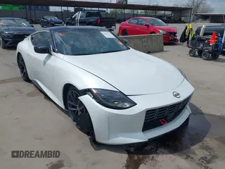 2024 Nissan Z Performance with VIN JN1BZ4BH1RM361447, listed as a IAAI auction lot 41903275 with 9,574 mi miles and . Bid and sale history available at DreamBid. Image 1.