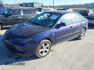 2006 Mazda 3 i with VIN JM1BK12F861468765, listed as a IAAI auction lot 41672325 with 247,918 mi miles. Bid and sale history available at carsss.com. Image 2.