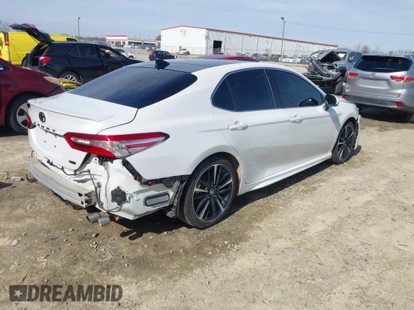 2020 Toyota Camry XSE with VIN 4T1K61AK8LU987937, listed as a IAAI auction lot 41604530 with 102,967 mi miles and . Bid and sale history available at DreamBid. Image 4.