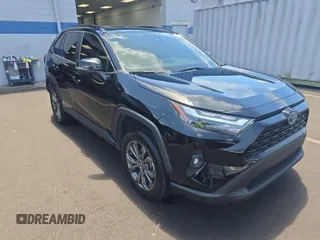 2022 Toyota RAV4 Hybrid XLE Premium z VIN 4T3B6RFVXNU071885, wystawiony jako IAAI lot #42730174 z przebiegiem 53 502 mil mil oraz . Historia ofert i sprzedaży dostępna na DreamBid. Obrazek 14.