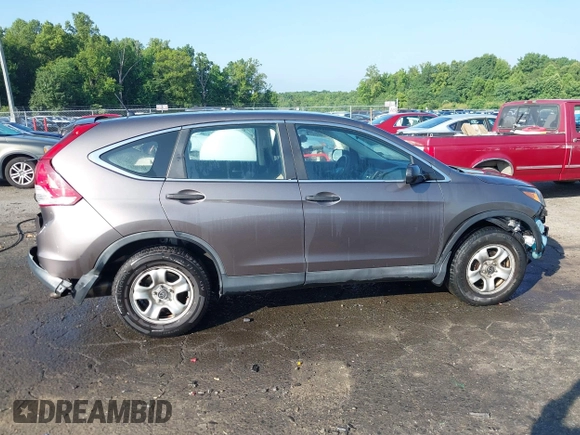 2013 Honda CR-V LX with VIN 3CZRM3H31DG703436, listed as a IAAI auction lot 42702584 with 140,013 mi miles and . Bid and sale history available at DreamBid. Image 14.