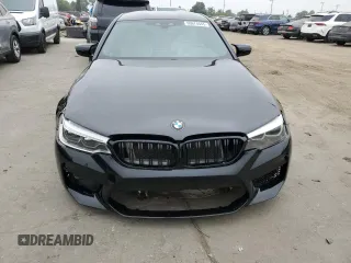 2020 BMW M5 z VIN WBSJF0C02LCE10800, wystawiony jako Copart lot #60674545 z przebiegiem Nie podano mil oraz Szkoda całkowita • Salvage title. Historia ofert i sprzedaży dostępna na DreamBid. Obrazek 5.