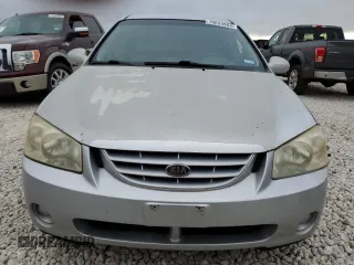 2006 Kia Spectra EX with VIN KNAFE121X65333208, listed as a Copart auction lot 70634994 with 145,288 mi miles and Salvage Title. Bid and sale history available at carsss.com. Image 5.