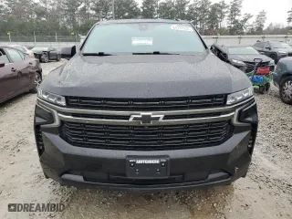 2021 Chevrolet Suburban RST with VIN 1GNSKEKD4MR210450, listed as a Copart auction lot 84372054 with 98,560 mi miles and Salvage Title. Bid and sale history available at carsss.com. Image 5.