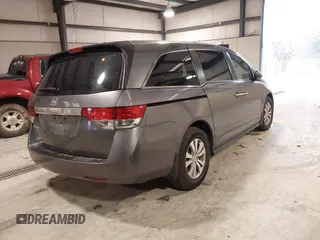 2015 Honda Odyssey EX-L with VIN 5FNRL5H65FB126479, listed as a IAAI auction lot 38993955 with 196,199 mi miles and . Bid and sale history available at carsss.com. Image 4.
