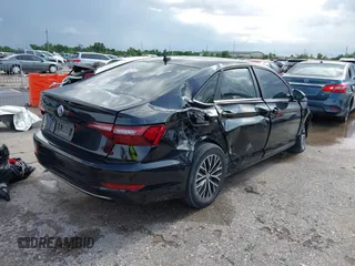2021 Volkswagen Jetta S with VIN 3VWC57BU3MM060961, listed as a IAAI auction lot 42536668 with 88,576 mi miles and . Bid and sale history available at DreamBid. Image 4.