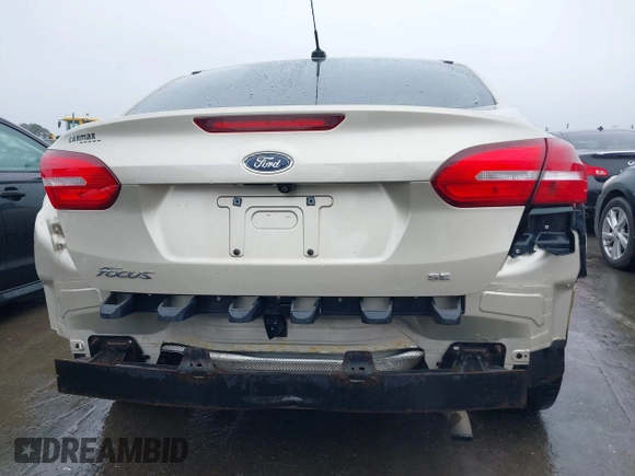 2018 Ford Focus SE with VIN 1FADP3F27JL219423, listed as a IAAI auction lot 41575274 with 73,574 mi miles. Bid and sale history available at carsss.com. Image 16.