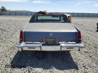 1980 Cadillac Eldorado z VIN 6L578AE609480, wystawiony jako Copart lot #58422345 z przebiegiem 85 604 mil mil oraz Tytuł czysty. Historia ofert i sprzedaży dostępna na DreamBid. Obrazek 6.