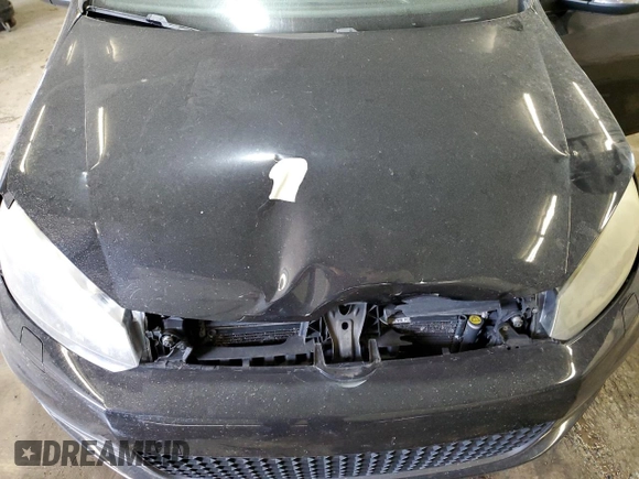2010 Volkswagen GTI z VIN WVWGV7AJ2AW312660, wystawiony jako Copart lot #60937865 z przebiegiem 120 101 mil mil oraz Szkoda całkowita • Salvage title. Historia ofert i sprzedaży dostępna na DreamBid. Obrazek 11.