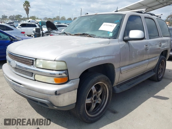 2004 Chevrolet Tahoe LS z VIN 1GNEC13T84J103666, wystawiony jako IAAI lot #41921063 z przebiegiem 209 404 mil mil oraz . Historia ofert i sprzedaży dostępna na DreamBid. Obrazek 2.