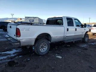 2000 Ford F-350 XL with VIN 1FTSW31F8YEA82117, listed as a Copart auction lot 82800154 with 236,161 mi miles and Salvage Title. Bid and sale history available at DreamBid. Image 3.