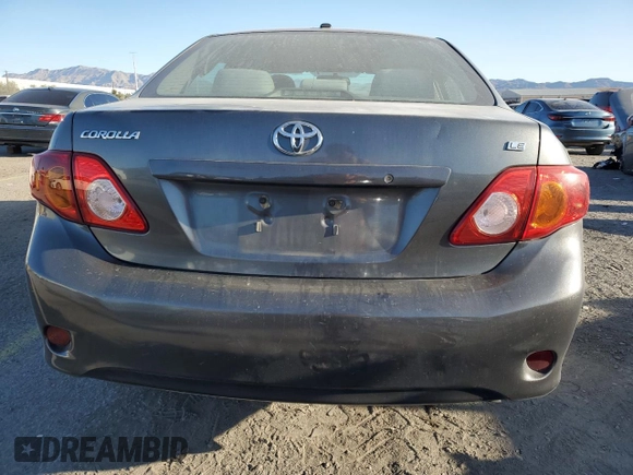 2010 Toyota Corolla with VIN 2T1BU4EE1AC363990, listed as a Copart auction lot 52001595 with 244,000 mi miles and Salvage title. Bid and sale history available at DreamBid. Image 6.