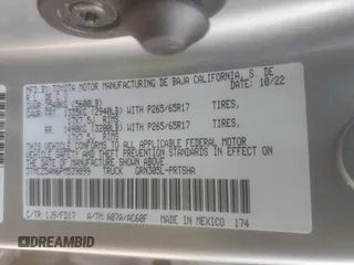 2023 Toyota Tacoma SR z VIN 3TMCZ5AN6PM539899, wystawiony jako Copart lot #52238445 z przebiegiem 30 070 mil mil oraz Szkoda całkowita • Salvage title. Historia ofert i sprzedaży dostępna na DreamBid. Obrazek 14.