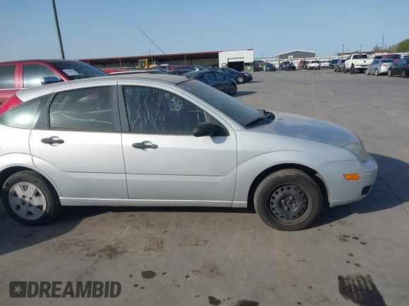 2007 Ford Focus S with VIN 1FAHP37N97W199399, listed as a IAAI auction lot 41854900 with 137,601 mi miles and . Bid and sale history available at carsss.com. Image 13.