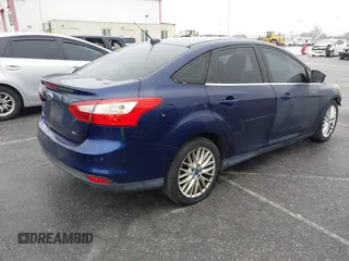 2012 Ford Focus SEL with VIN 1FAHP3H20CL149796, listed as a IAAI auction lot 41895850 with 144,668 mi miles. Bid and sale history available at carsss.com. Image 4.