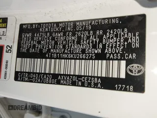 2019 Toyota Camry LE z VIN 4T1B11HK6KU266275, wystawiony jako IAAI lot #41978900 z przebiegiem 84 202 mil mil oraz . Historia ofert i sprzedaży dostępna na DreamBid. Obrazek 9.