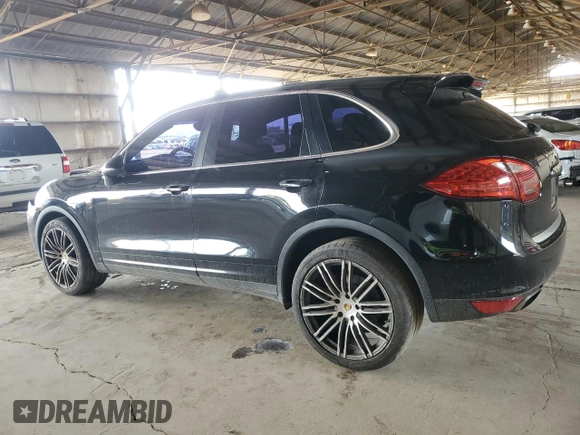 2011 Porsche Cayenne with VIN WP1AA2A29BLA00477, listed as a Copart auction lot 58501625 with 182,147 mi miles and Salvage title. Bid and sale history available at DreamBid. Image 2.