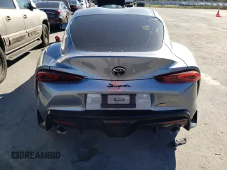 2022 Toyota Supra 3.0 z VIN WZ1DB0C05NW047232, wystawiony jako Copart lot #40346433 z przebiegiem 15 022 mil mil oraz . Historia ofert i sprzedaży dostępna na DreamBid. Obrazek 6.