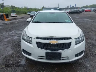 2014 Chevrolet Cruze 1LT with VIN 1G1PC5SB6E7233051, listed as a IAAI auction lot 42214334 with 88,389 mi miles and . Bid and sale history available at DreamBid. Image 12.