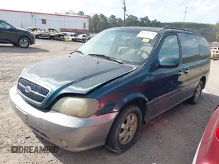 2005 Kia Sedona LX with VIN KNDUP132X56735119, listed as a IAAI auction lot 41798736 with 196,460 mi miles. Bid and sale history available at carsss.com. Image 2.