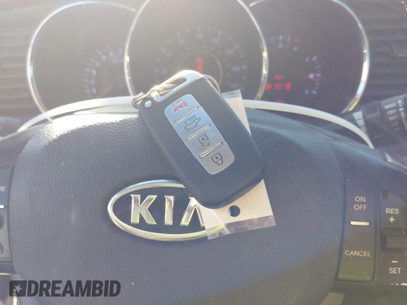 2012 Kia Optima EX with VIN 5XXGN4A65CG054990, listed as a IAAI auction lot 41668971 with 192,853 mi miles and . Bid and sale history available at carsss.com. Image 11.