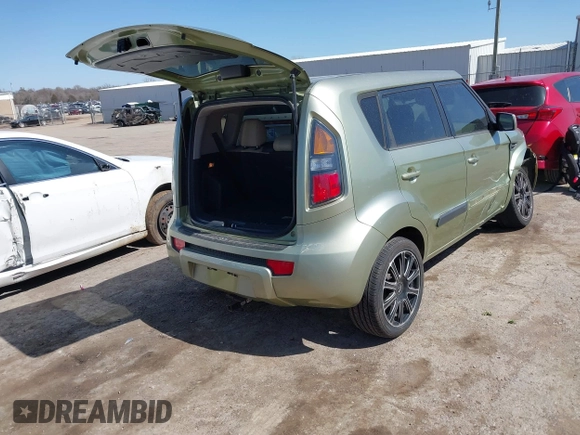 2011 Kia Soul + with VIN KNDJT2A22B7330062, listed as a IAAI auction lot 41772382 with 170,000 mi miles. Bid and sale history available at carsss.com. Image 4.