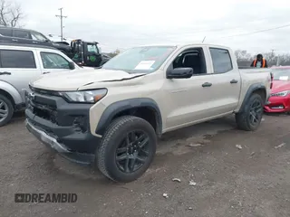2023 Chevrolet Colorado 4WD Trail Boss with VIN 1GCPTEEK8P1239877, listed as a IAAI auction lot 40893691 with 30,617 mi miles. Bid and sale history available at carsss.com. Image 2.