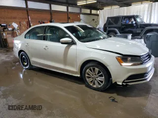 2015 Volkswagen Jetta SE with VIN 3VWD17AJ4FM308693, listed as a Copart auction lot 59987585 with 87,136 mi miles and Salvage title. Bid and sale history available at DreamBid. Image 4.