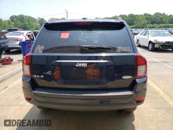 2016 Jeep Compass Latitude with VIN 1C4NJDEB4GD758009, listed as a Copart auction lot 60704745 with 143,393 mi miles and Salvage title. Bid and sale history available at DreamBid. Image 6.