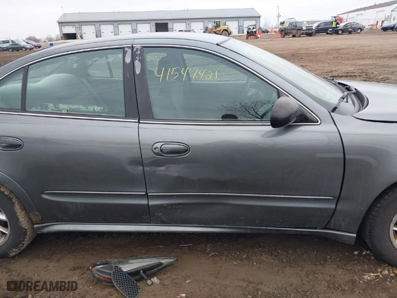 2004 Pontiac Grand Am SE with VIN 1G2NE52FX4M674634, listed as a IAAI auction lot 41547421 with 125,225 mi miles. Bid and sale history available at carsss.com. Image 13.