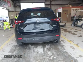 2023 Mazda CX-5 S Premium Plus z VIN JM3KFBEM8P0130642, wystawiony jako IAAI lot #41879316 z przebiegiem Nie podano mil oraz . Historia ofert i sprzedaży dostępna na DreamBid. Obrazek 15.