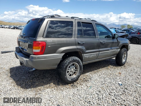 1999 Jeep Grand Cherokee Laredo с VIN 1J4GW58S5XC612309, выставлен на аукционе Copart как лот 56705085 с пробегом 200 004 миль миль и Списание • Salvage title. История ставок и продаж доступна на DreamBid. Изображение 3.