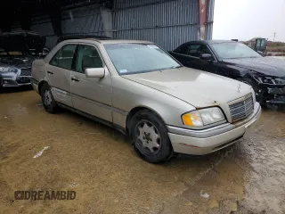 1997 Mercedes-Benz C with VIN WDBHA28E3VF530316, listed as a Copart auction lot 85938384 with 169,664 mi miles and Salvage Title. Bid and sale history available at carsss.com. Image 4.