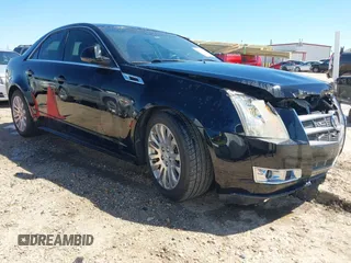 2011 Cadillac CTS Premium z VIN 1G6DS5ED9B0121975, wystawiony jako IAAI lot #41830162 z przebiegiem 117 938 mil mil oraz . Historia ofert i sprzedaży dostępna na DreamBid. Obrazek 1.