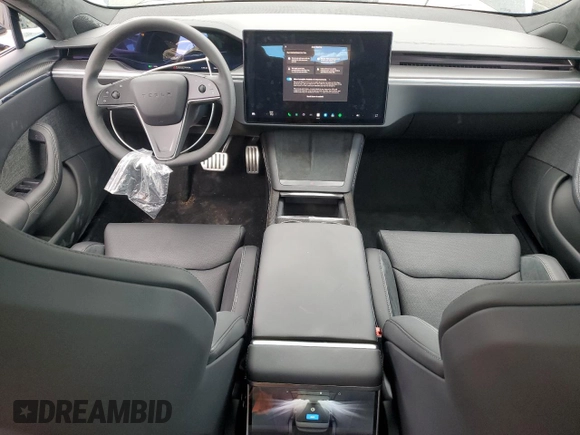 2024 Tesla Model S Plaid z VIN 5YJSA1E65RF543822, wystawiony jako Copart lot #48545205 z przebiegiem 2 473 mil mil oraz Szkoda całkowita • Salvage title. Historia ofert i sprzedaży dostępna na DreamBid. Obrazek 8.