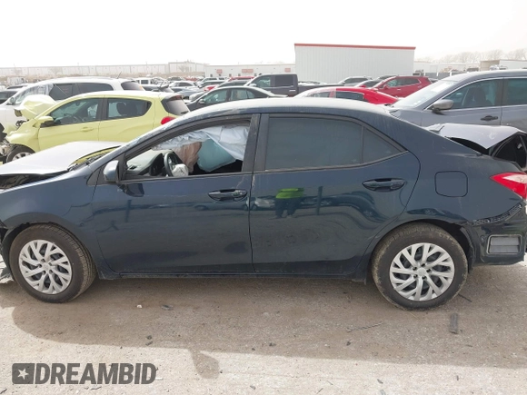 2018 Toyota Corolla L z VIN 5YFBURHE6JP840504, wystawiony jako IAAI lot #41790115 z przebiegiem 83 026 mil mil oraz . Historia ofert i sprzedaży dostępna na DreamBid. Obrazek 13.