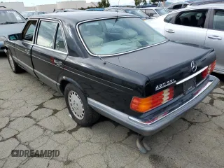 1990 Mercedes-Benz 420 with VIN WDBCA35E8LA539818, listed as a Copart auction lot 45764444 with 219,036 mi miles and Salvage Title. Bid and sale history available at carsss.com. Image 2.
