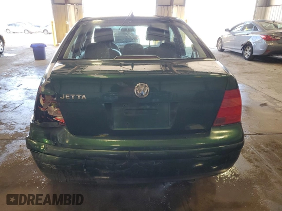 1999 Volkswagen Jetta GL z VIN 3VWRC29M2XM094970, wystawiony jako Copart lot #52618145 z przebiegiem Nie podano mil oraz Szkoda całkowita • Salvage title. Historia ofert i sprzedaży dostępna na DreamBid. Obrazek 6.