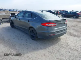 2020 Ford Fusion SE with VIN 3FA6P0HD7LR169021, listed as a IAAI auction lot 41575796 with 77,824 mi miles. Bid and sale history available at carsss.com. Image 3.