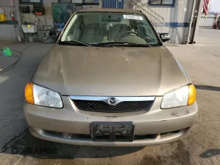1999 Mazda Protege DX z VIN JM1BJ2223X0137153, wystawiony jako Copart lot #87899735 z przebiegiem 154 209 mil mil oraz Szkoda całkowita • Salvage title. Historia ofert i sprzedaży dostępna na DreamBid. Obrazek 5.